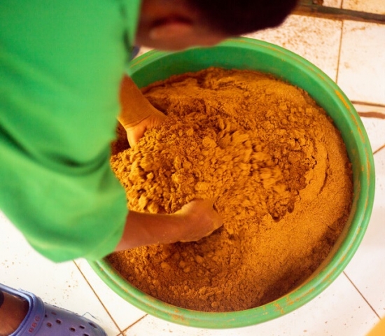 Employee at Senka Food Products making spices.
