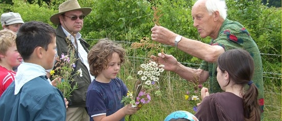 Bill Acworth talks about the plants on his farm at his Little Hidden Farm fundraiser in 2013.