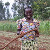 Young vegetable farmer smiles her way back to school