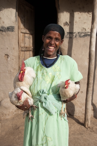 Rearing chickens has made a real difference to Regina's life, boosting her family's income for the long term.