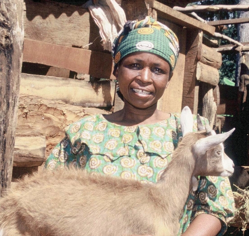 Female farmer, Fabian, and her goat, Kenya.