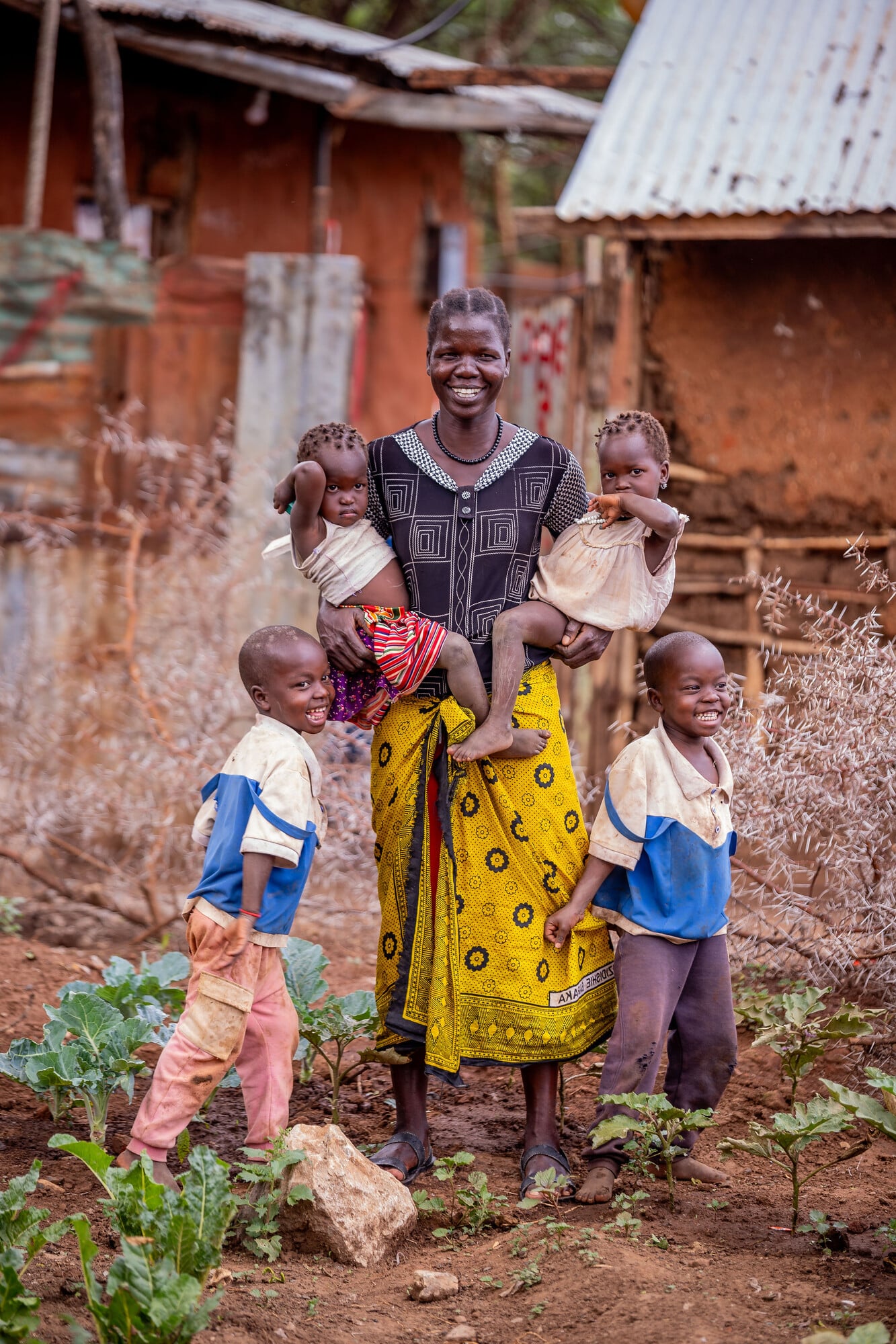 Florence from Karamoja with her children: two sets of twins.