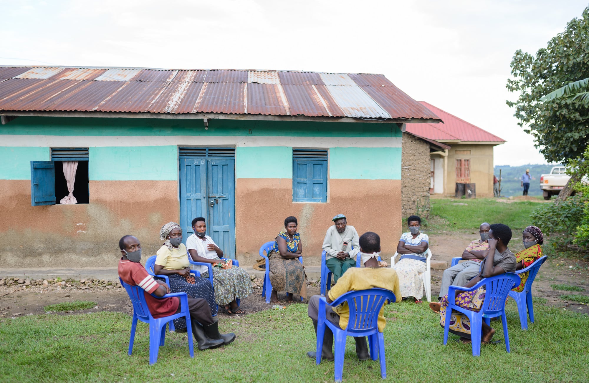 Hildah with the other members of the Banyakinkizi Coffee Producers and Processors Cooperative.