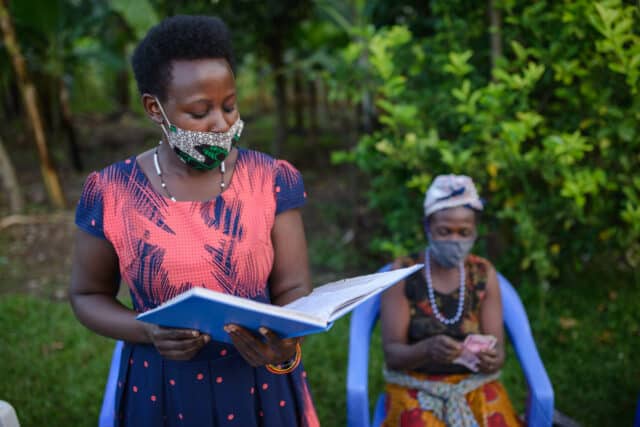 Hildah speaking at her cooperative.