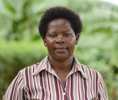 Headshot of Patience Ninsiima, coffee farmer from Kanungu, Uganda.
