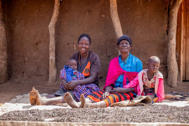 Betty and her friend sat with their children.