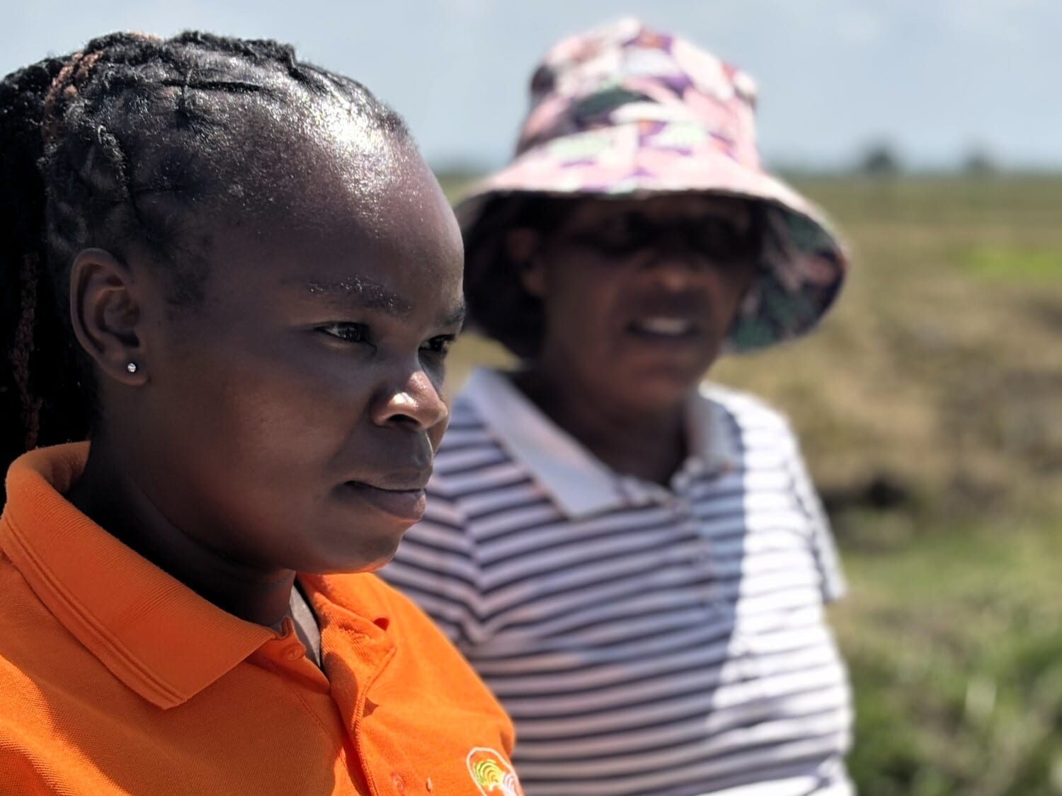 Felista (left) pictured on her farm in Embu in Kenya.