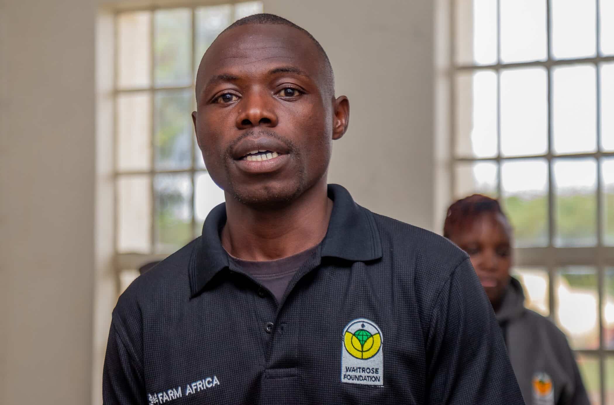 Portrait shot of Michael, a vegetable farmer in Kenya.