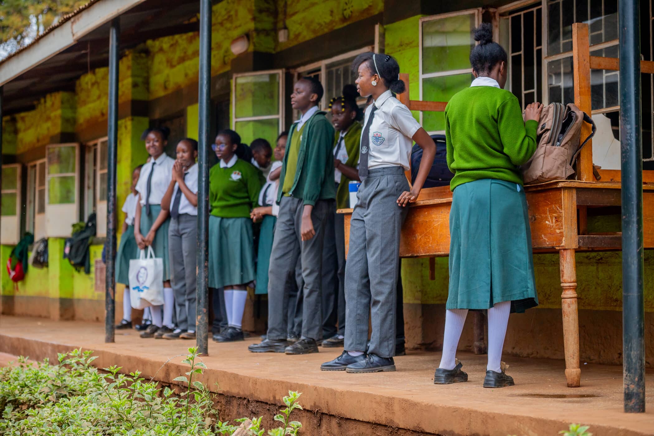Pupils standing outside a school in Kenya.