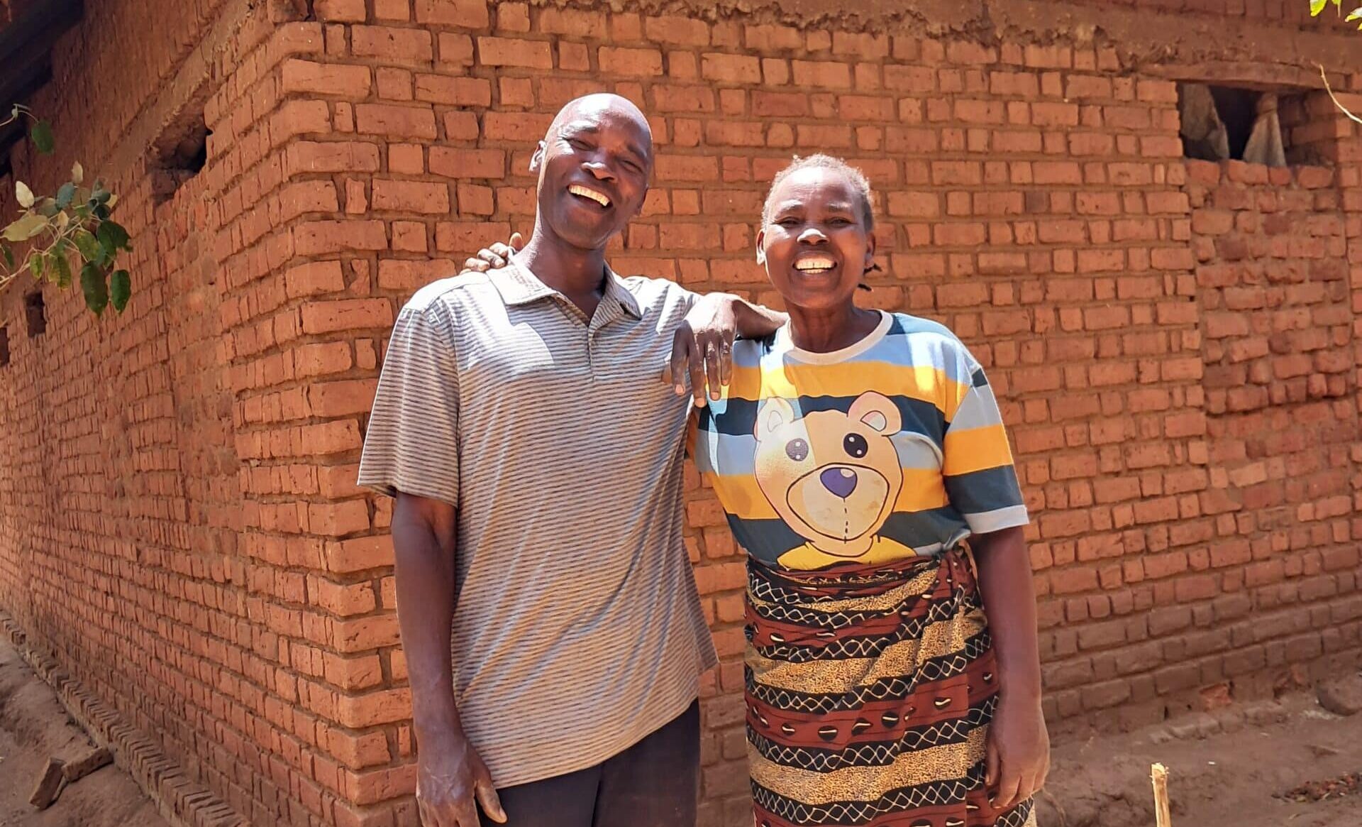 Farmer, Lotty Malekela, and woman